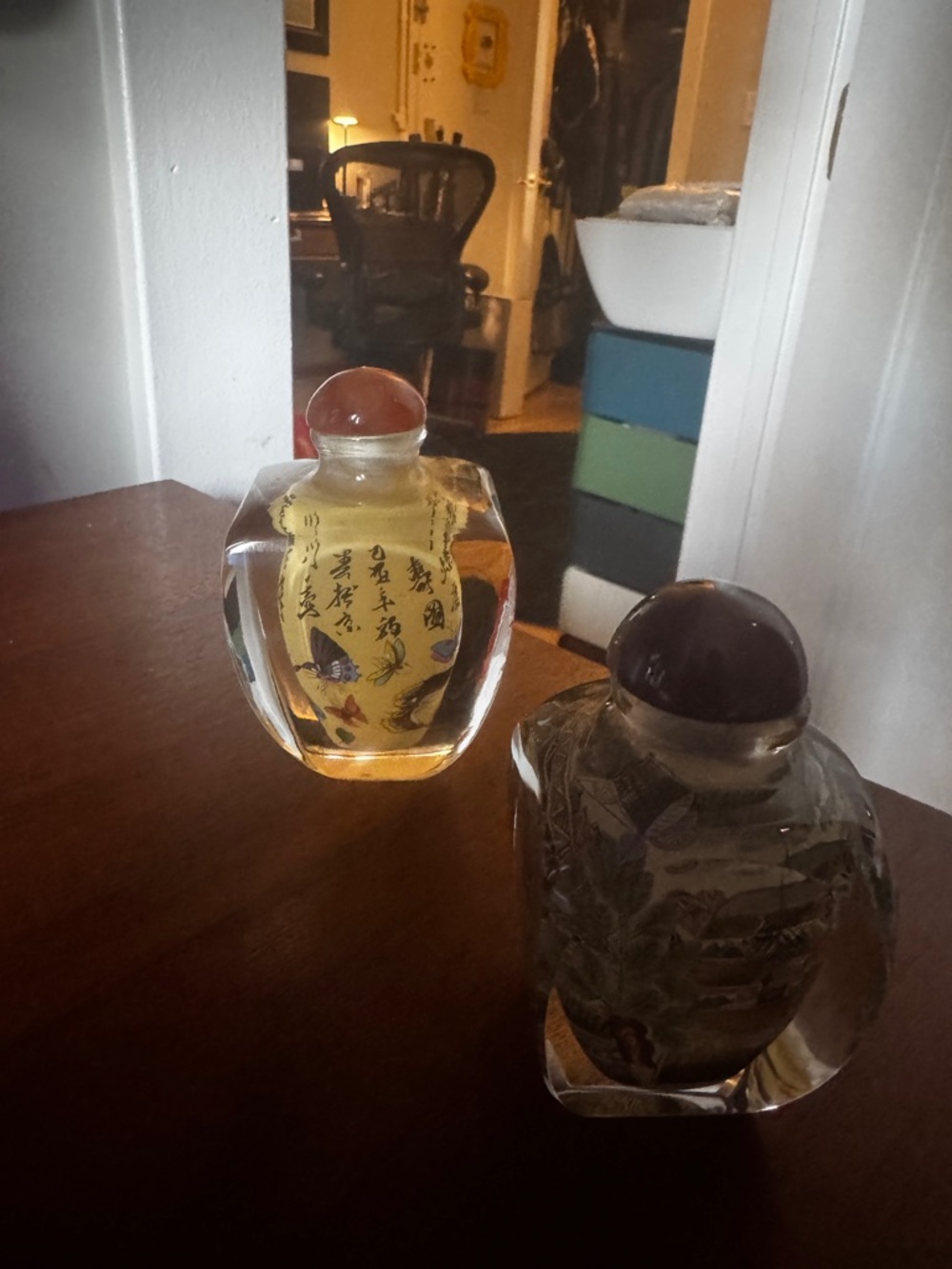 Pair of Chinese Snuff Bottles with Amber Stoppers